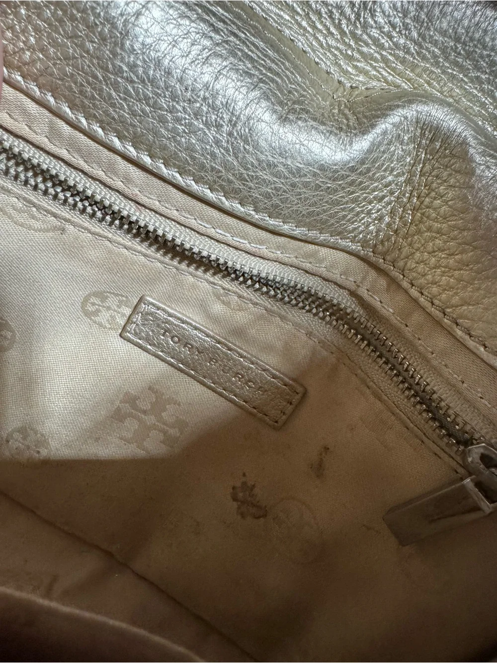 Tory Burch gold clutch bag